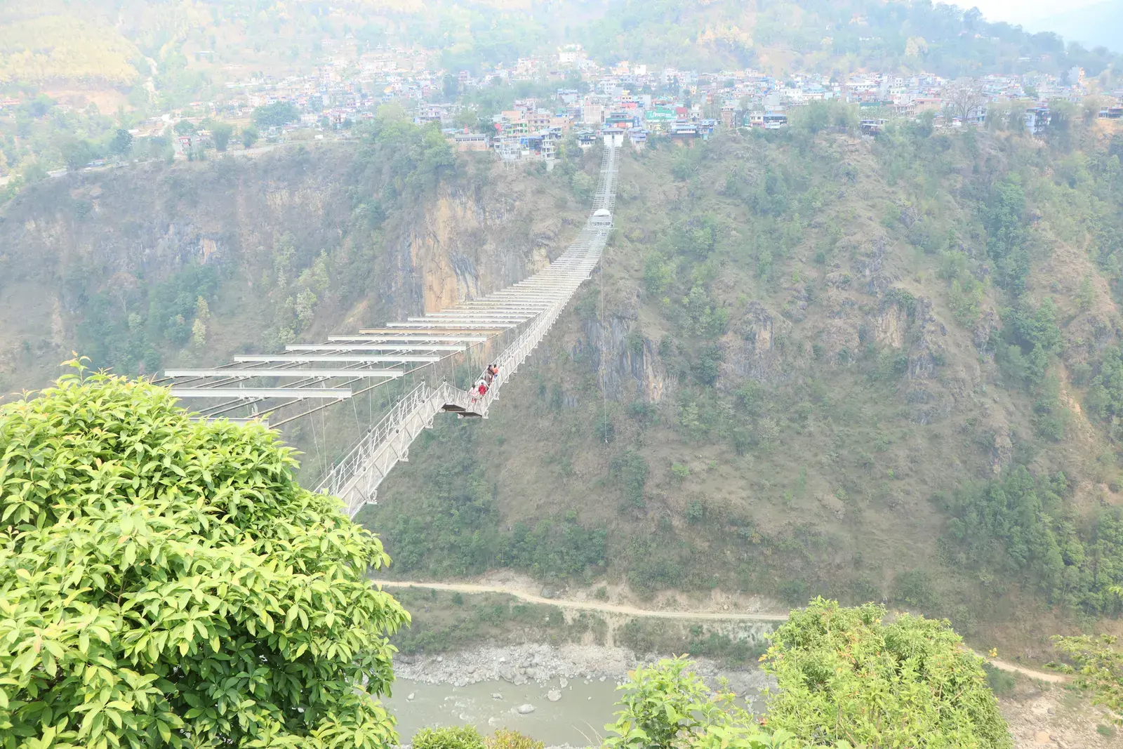 Suspension bridge across the gorge at Kushma, Parbat